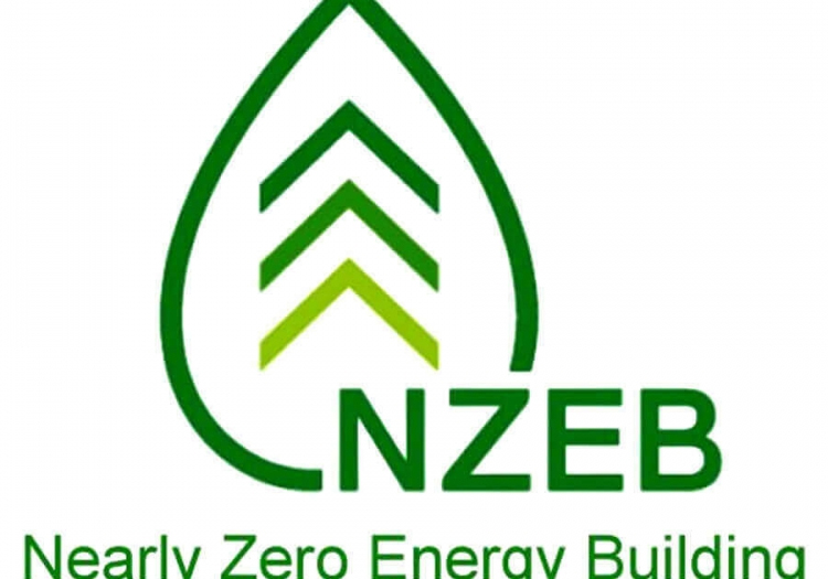 Logo featuring a stylized green leaf with three white chevrons resembling a tree. The acronym ‘NZEB’ is prominently displayed in black, with ‘Nearly Zero Energy Building’ in green below. The logo emphasizes low-energy and sustainable building practices